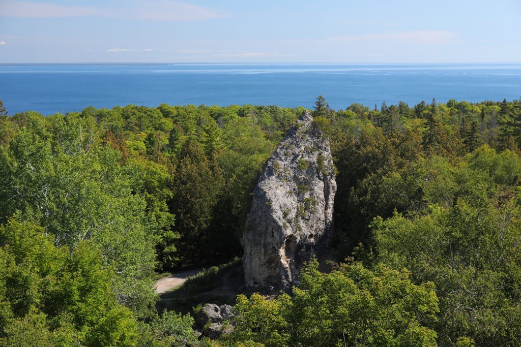 Mackinac Island’s Sugar Loaf rises 75 feet out of the earth in the middle of the Mackinac Island State Park forest.