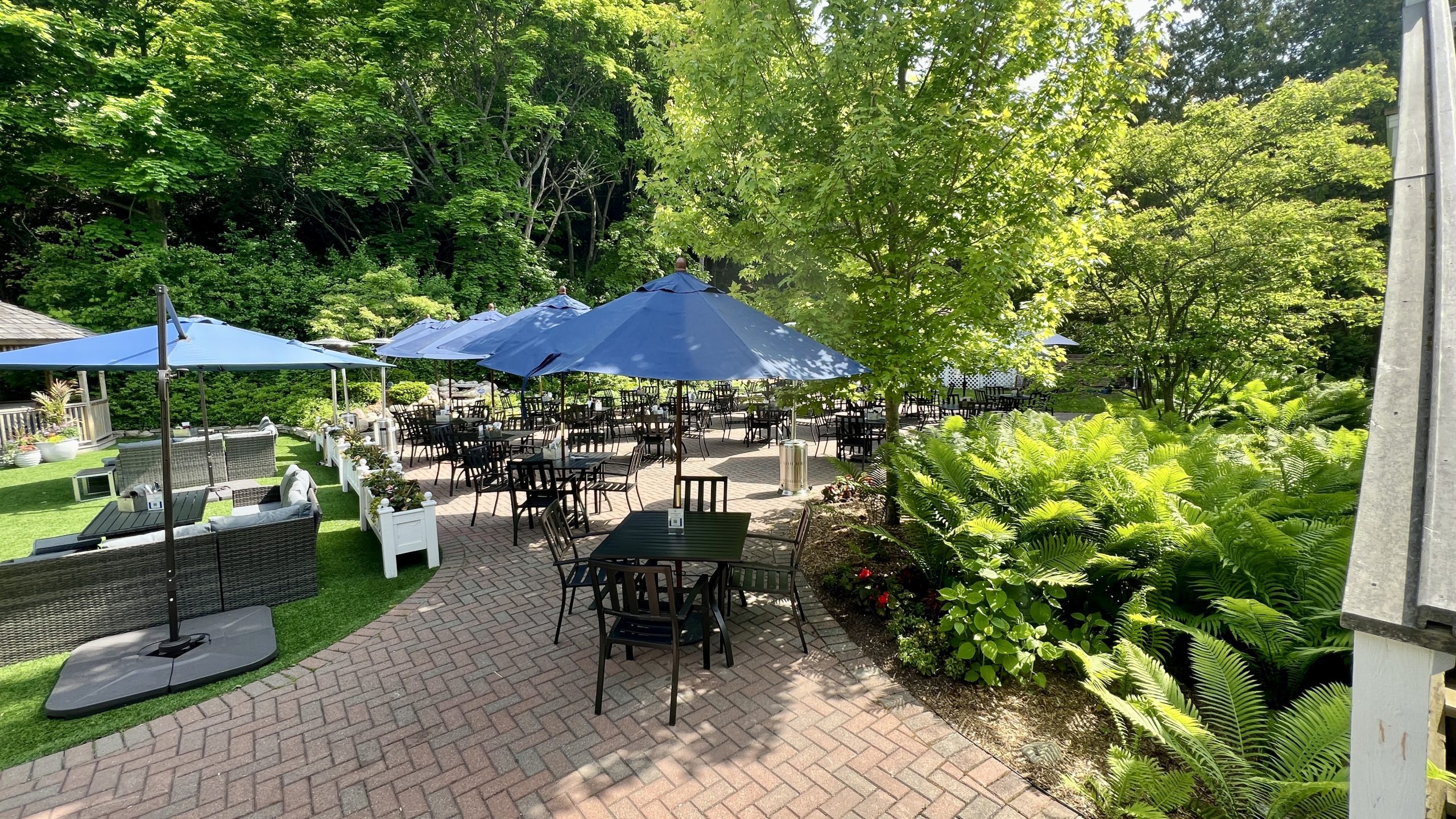 The outdoor garden at Ice House BBQ on Mackinac Island is a beautiful place for lawn games, food and drink.