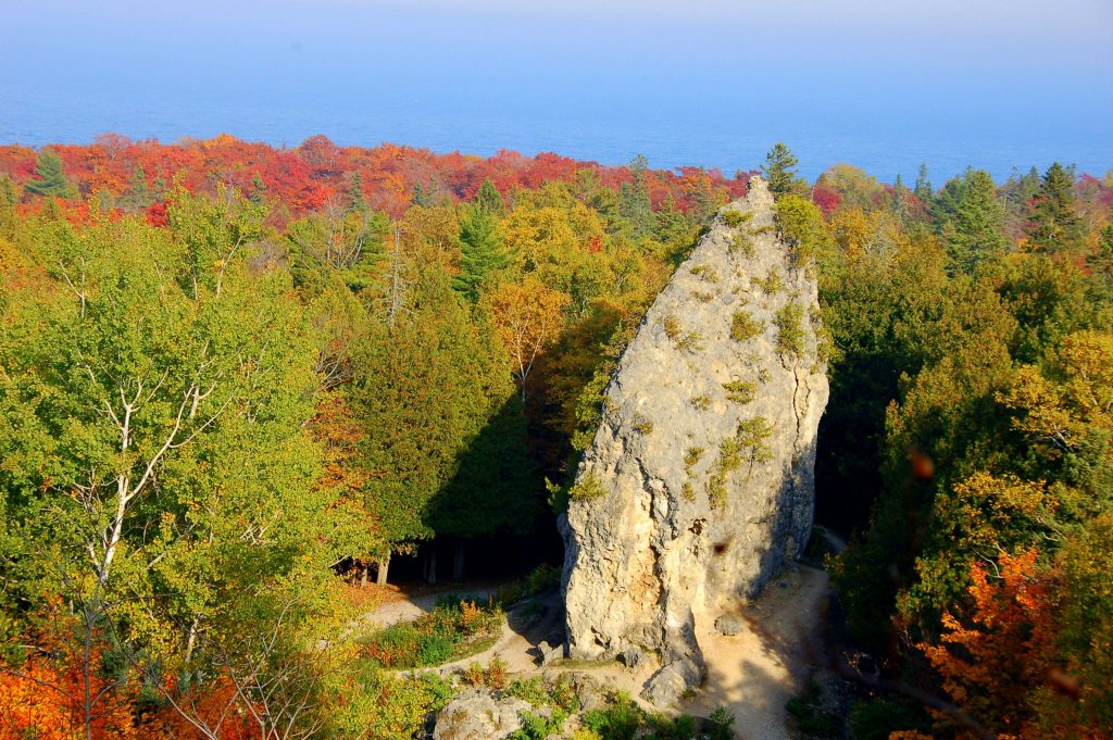 Fall colors in Mackinac Island State Park give even more beauty to iconic rock formations such as Sugar Loaf.