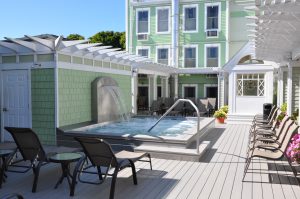 A heated spa pool with waterfall is on the sun deck at Mackinac Island’s Murray Hotel.