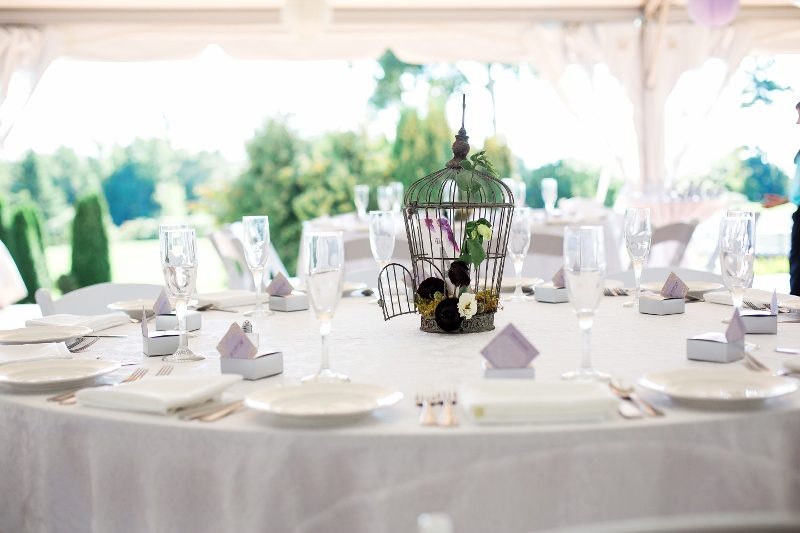 A beautiful table setting for a Mackinac Island wedding under a covered pavilion