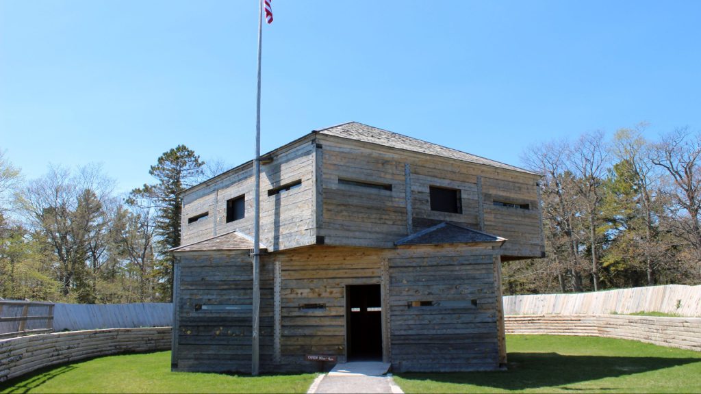 An American flag flies above the two-story blockhouse at Fort Holmes on Michigan’s Mackinac Island
