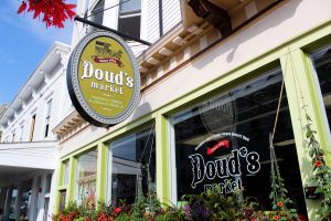 A sign out front of Mackinac Island’s historic Doud’s Market identifies it as America’s oldest grocery store.