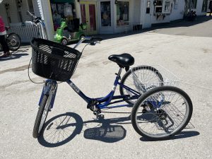 A three-wheeled adult tricycle, or trike, is one of many ways of getting around Mackinac Island.