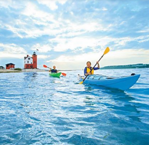 Round Island Lighthouse is a popular destination for paddlers on kayak tours around Mackinac Island.