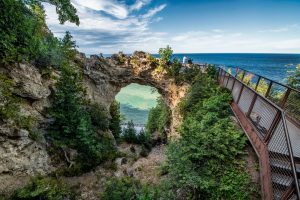 Mackinac Island’s legendary Arch Rock offers a spectacular view 140 feet above Lake Huron and the road below