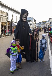 Mackinac Island’s Halloween Weekend includes trick-or-treating by day for kids and adult costume parties at night.
