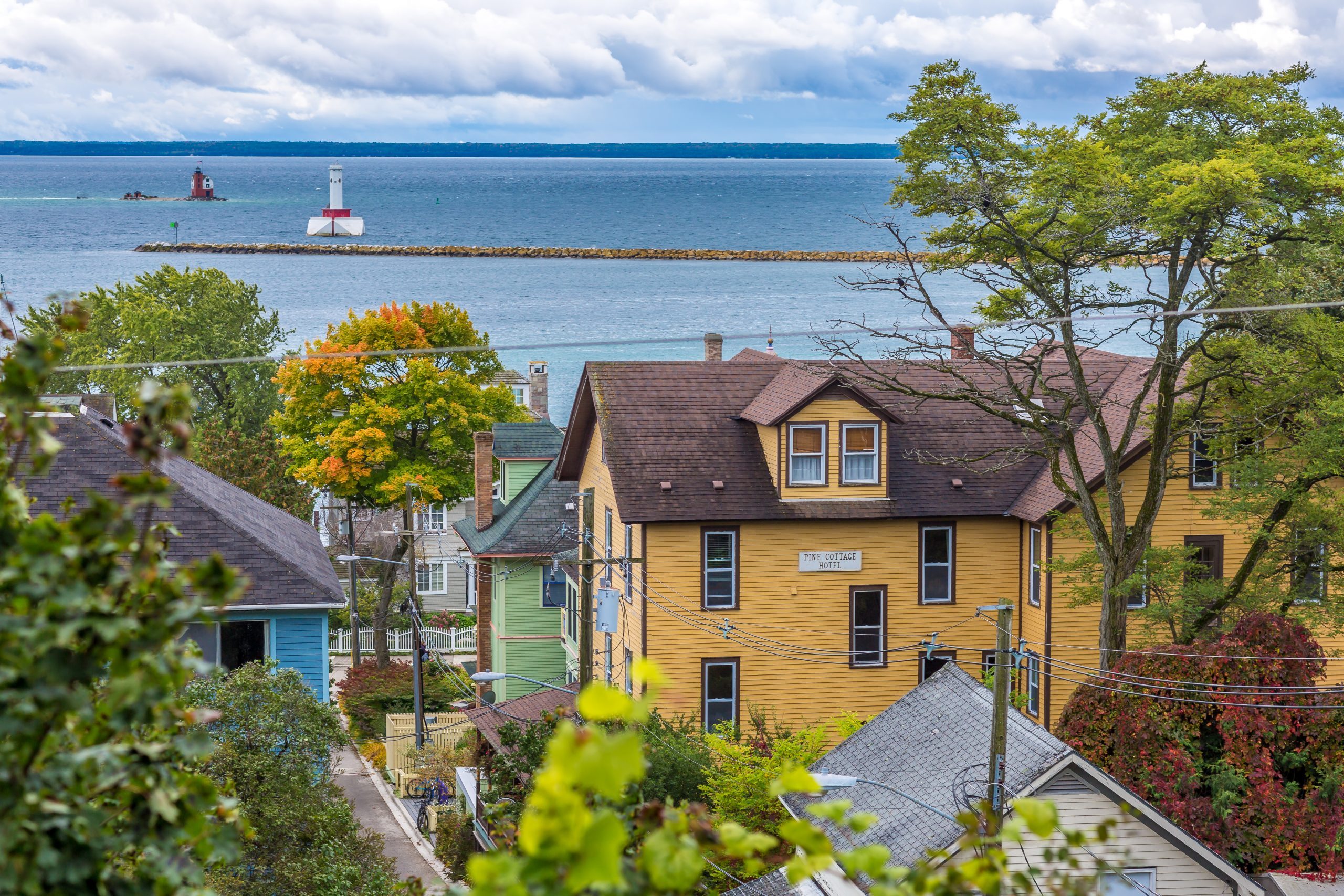 A view of the water surrounding Michigan’s Mackinac Island with Bogan Lane and Pine Cottage B&B in the foreground.