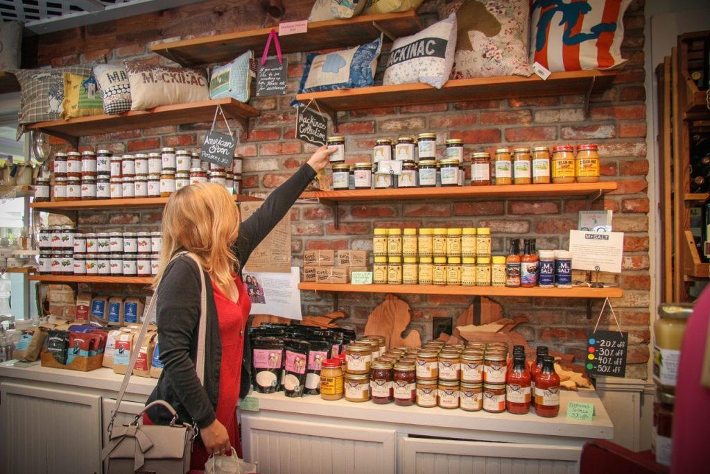 Woman Shopping for Preserves and Condiments in Shop on Mackinac Island
