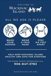 Mackinac Island encourages visitors to wash hands, wear masks and stay six feet apart during the COVID-19 pandemic.