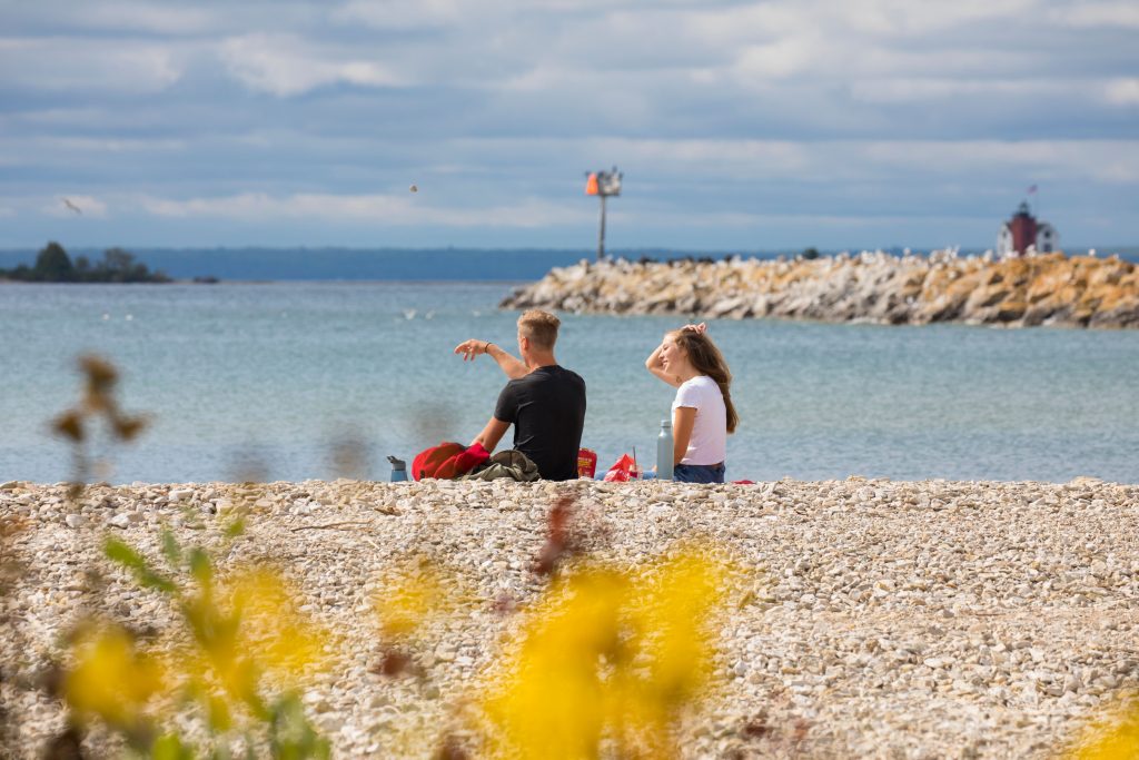 Sunny fall days on Mackinac Island are perfect for picnics in Marquette Park or along the waterfront.