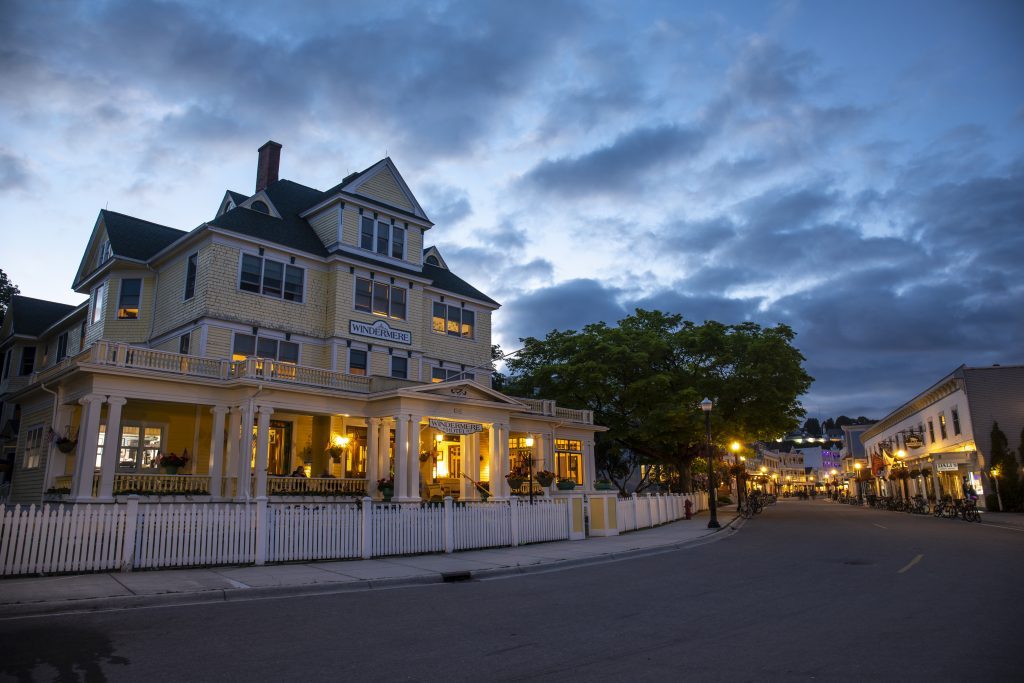 Mackinac Island’s Windermere Hotel stands in the fading twilight of the day as night comes to Main Street