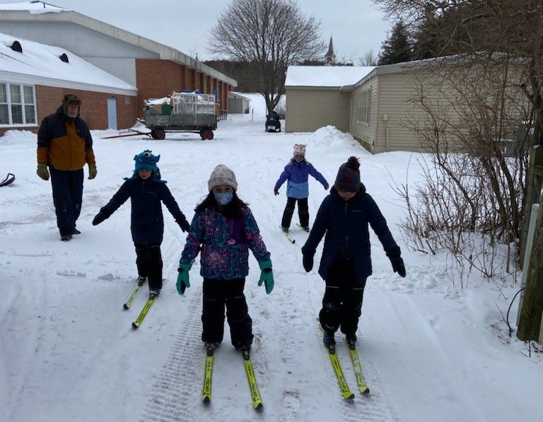 Mackinac Island Public School elementary students learn to cross-country ski during physical education class.