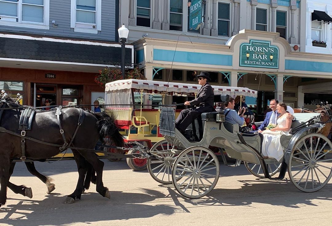 Horse-Drawn Carriage with Newly-Wed Couple on Mackinac Island