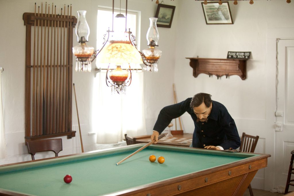 A wax figure of a 19th-century American soldier plays billiards in an exhibit at Mackinac Island’s historic Fort Mackinac