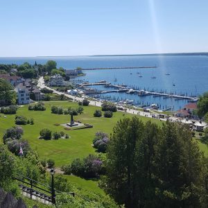 View From the Top of Fort Mackinac Overlooking Marquette Park Beside Waters Surrounding Mackinac Island