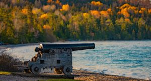 A cannon stands at British Landing, one of many sights to see on the 8.2-mile route around Mackinac Island on M-185.