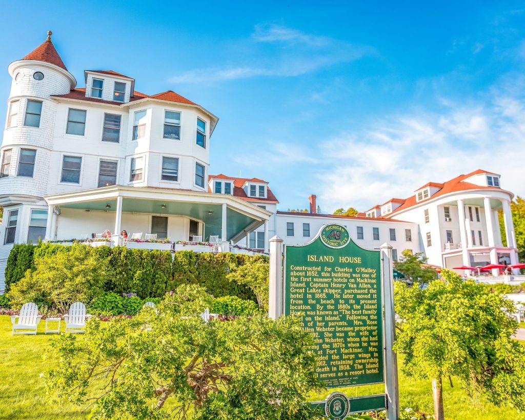 A Michigan Historic Site marker stands outside the Island House Hotel on Mackinac Island 