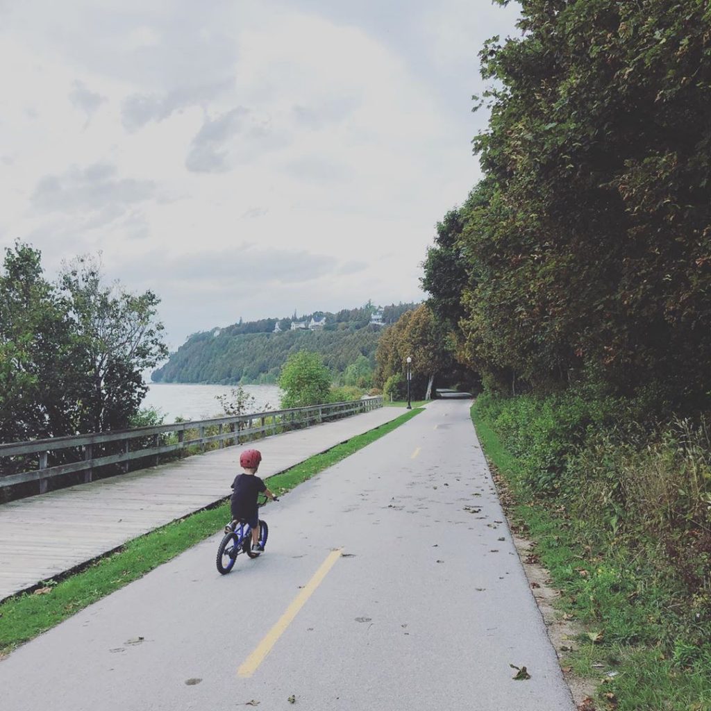 Social distancing is a natural way of experiencing Mackinac Island, where you can bike around the entire island on M-185.