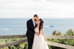 Mackinac Island wedding venues offer spectacular natural backdrops for wedding party photos such as the Straits of Mackinac.