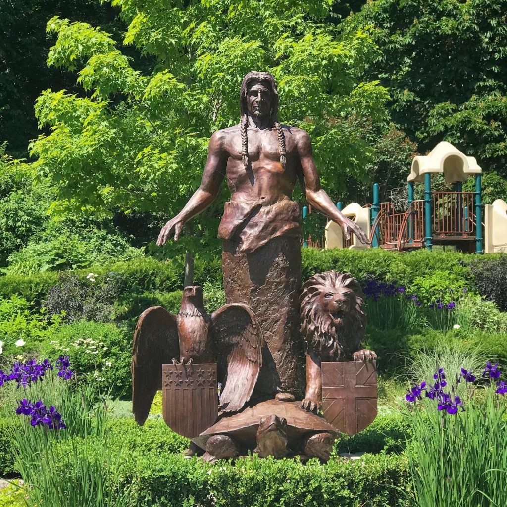 The centerpiece of Mackinac Island’s Peace Garden is a sculpture featuring a Native American spirit, eagle, lion and turtle.
