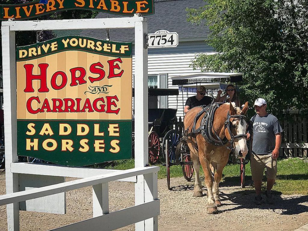 Before you depart on a Mackinac Island drive-it-yourself carriage ride, livery guides will give you a quick lesson.
